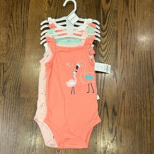 Carters set of 5 sleeveless 24 mo. bodysuits.